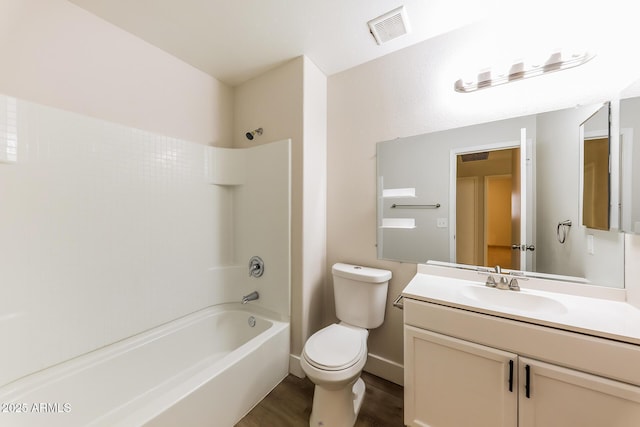 bathroom with shower / bathing tub combination, visible vents, toilet, and vanity