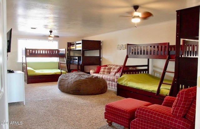 bedroom featuring crown molding and carpet flooring