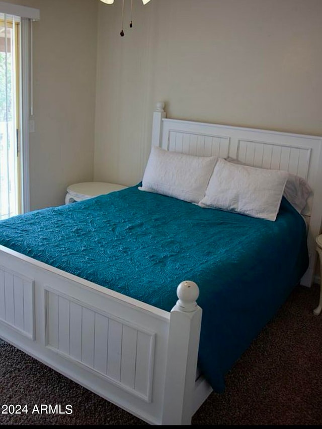 bedroom featuring carpet