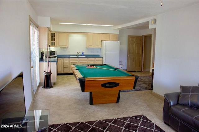 playroom featuring light tile patterned floors, pool table, and sink