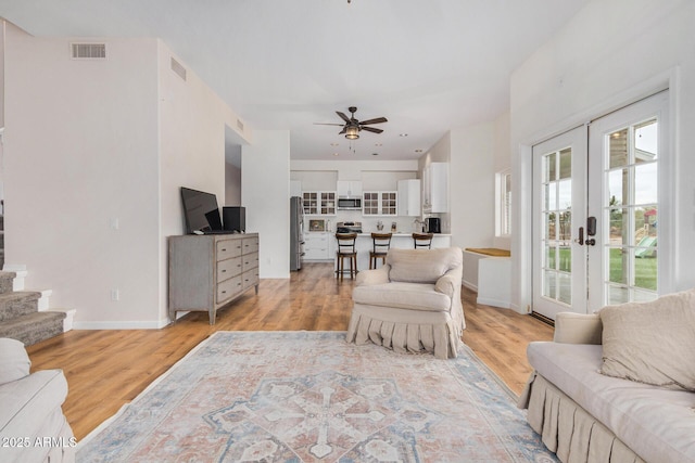 living room with visible vents and light wood finished floors