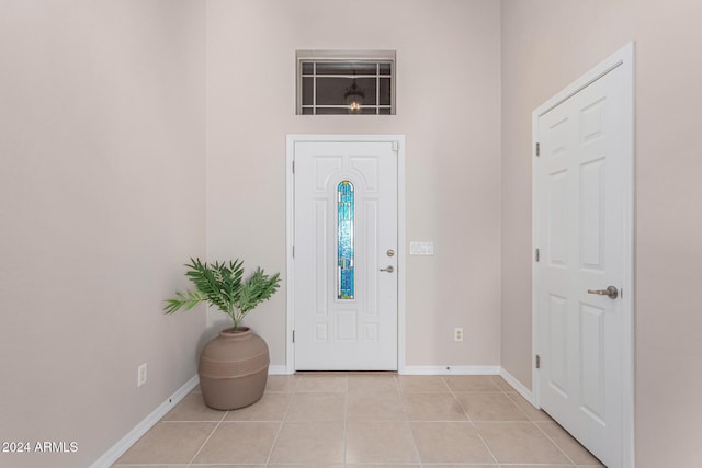 entrance foyer with light tile patterned flooring