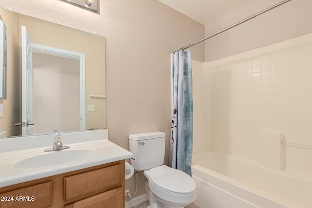 full bathroom with vanity, toilet, and shower / bath combo with shower curtain