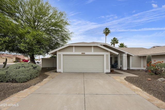 11430 N 109th St, Scottsdale, AZ 85259 - single story home featuring a garage, driveway, and a shingled roof