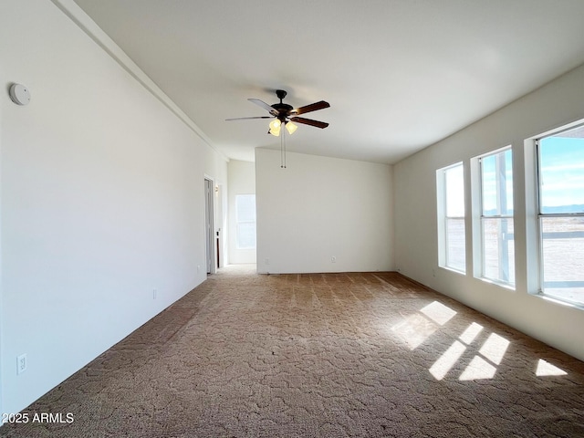 empty room with light carpet and ceiling fan