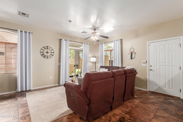 living room with ceiling fan