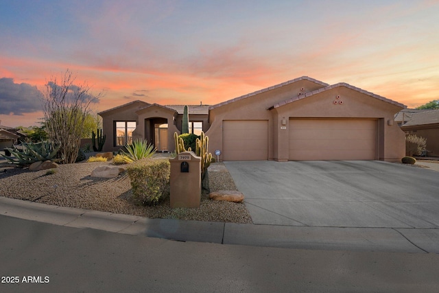 view of front of home with a garage