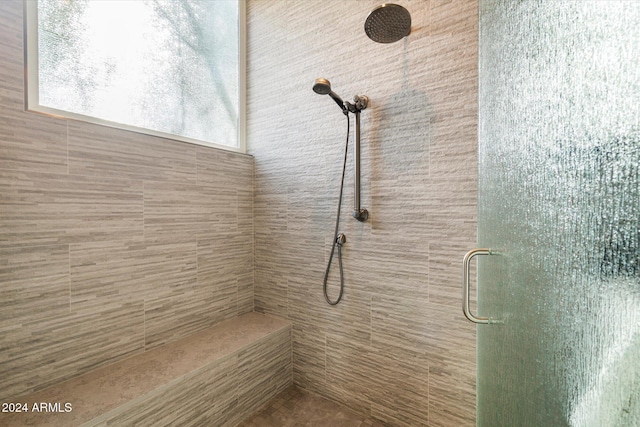 bathroom featuring an enclosed shower