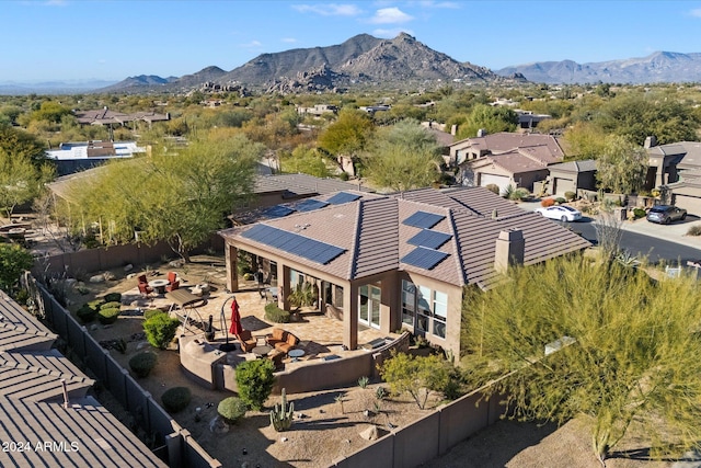 drone / aerial view featuring a mountain view