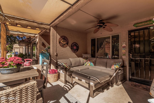 view of patio featuring ceiling fan and outdoor lounge area