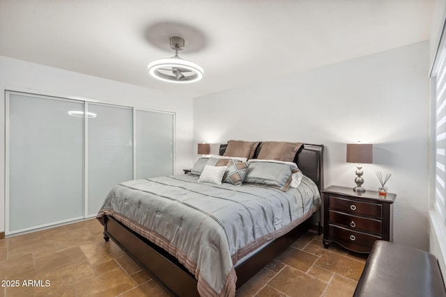 8787 E Mountain View Rd Unit 1100, Scottsdale, AZ 85258 - bedroom featuring a closet and stone tile flooring