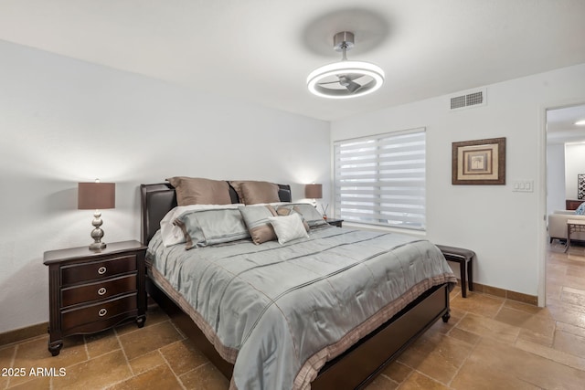 8787 E Mountain View Rd Unit 1100, Scottsdale, AZ 85258 - bedroom featuring stone tile flooring and baseboards