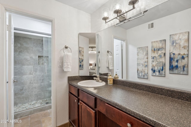 8787 E Mountain View Rd Unit 1100, Scottsdale, AZ 85258 - full bath featuring vanity, a stall shower, and a chandelier