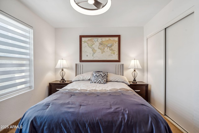 8787 E Mountain View Rd Unit 1100, Scottsdale, AZ 85258 - bedroom featuring a closet and wood finished floors