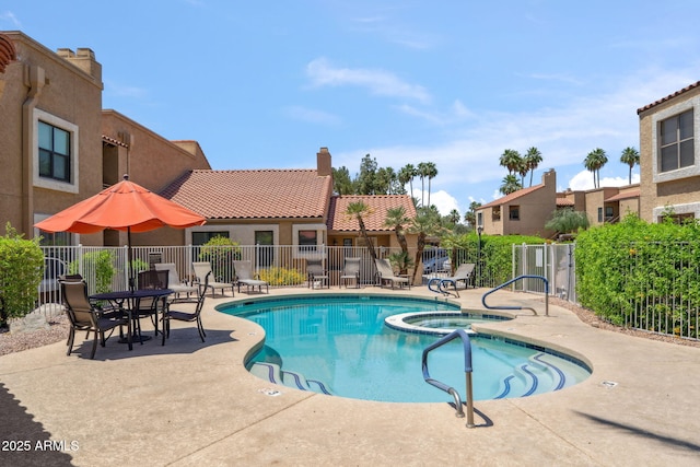 8787 E Mountain View Rd Unit 1100, Scottsdale, AZ 85258 - view of swimming pool with a pool with connected hot tub and a patio