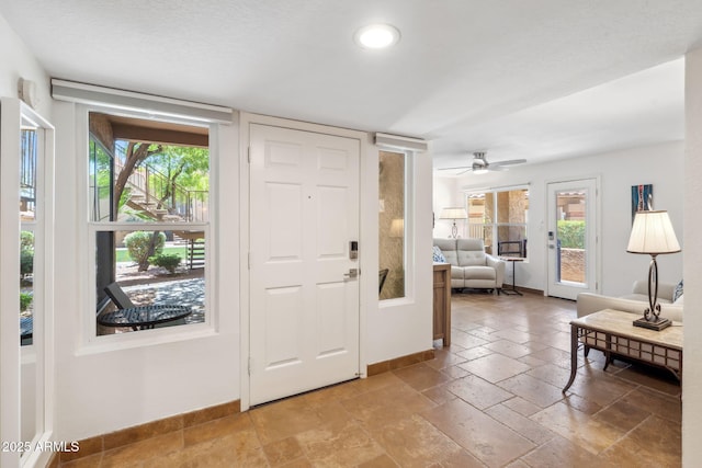 8787 E Mountain View Rd Unit 1100, Scottsdale, AZ 85258 - foyer with baseboards, ceiling fan, recessed lighting, and stone tile floors