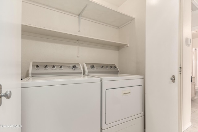 laundry area with washer and dryer