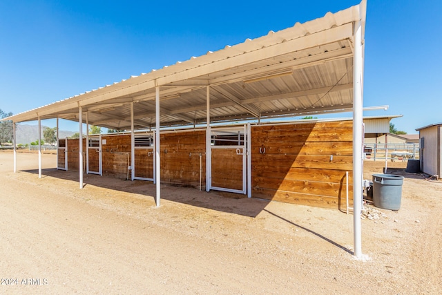 view of stable with an outdoor structure