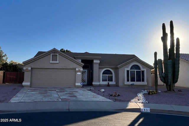 ranch-style home with a garage