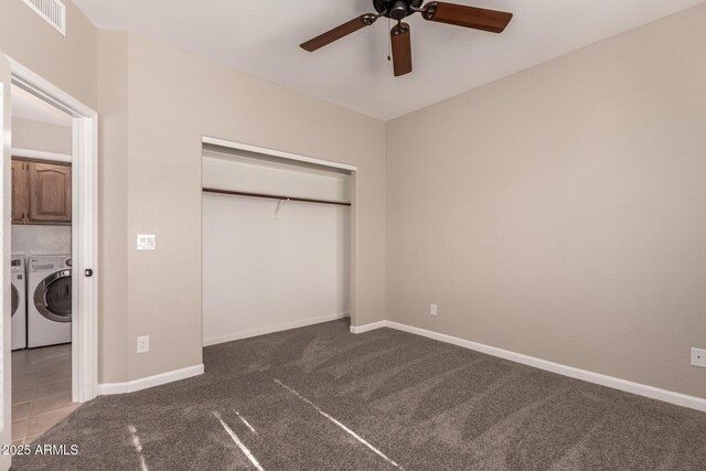 14602 N 63rd Pl, Scottsdale, AZ 85254 - unfurnished bedroom featuring washer and clothes dryer, carpet flooring, a closet, and baseboards