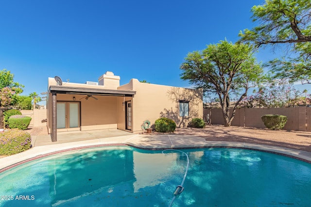 14602 N 63rd Pl, Scottsdale, AZ 85254 - rear view of property with stucco siding, french doors, a fenced backyard, and a patio