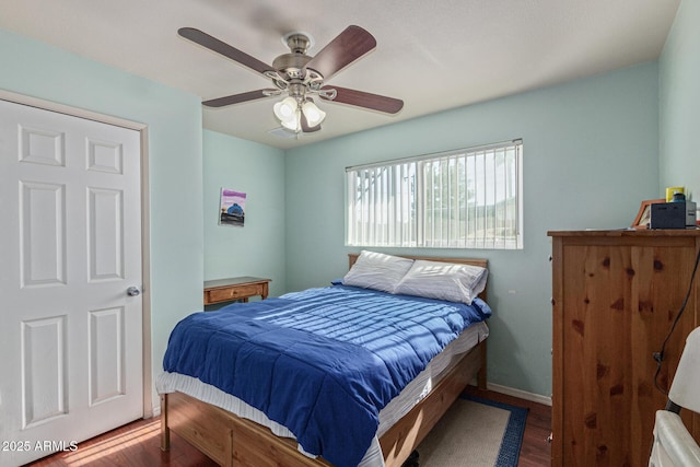 1235 E Dover St, Mesa, AZ 85203 - bedroom featuring wood finished floors, ceiling fan, and baseboards