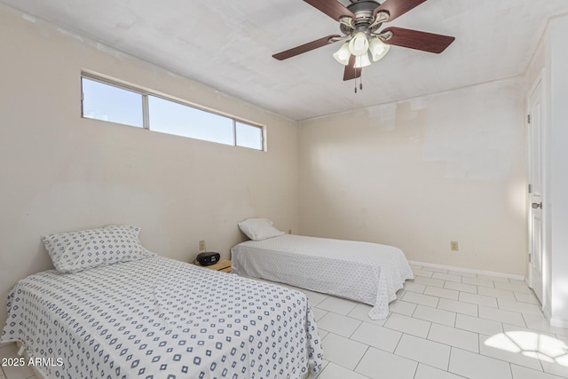 1235 E Dover St, Mesa, AZ 85203 - bedroom with a ceiling fan, tile patterned floors, and baseboards