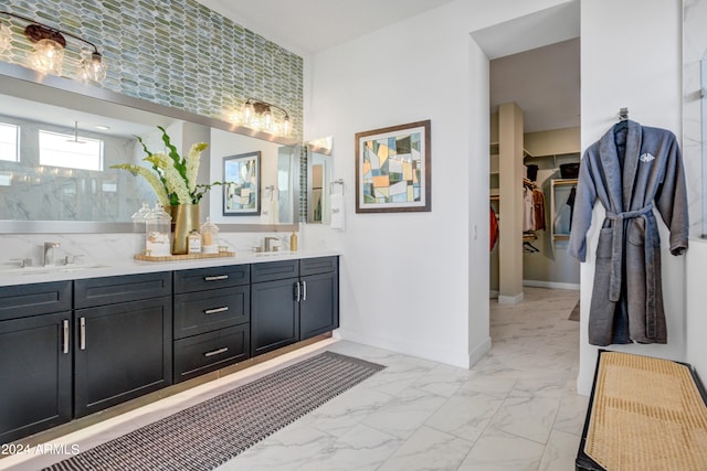 bathroom featuring vanity and a shower