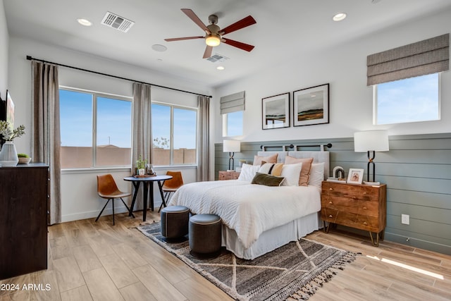 bedroom featuring light wood-type flooring and ceiling fan