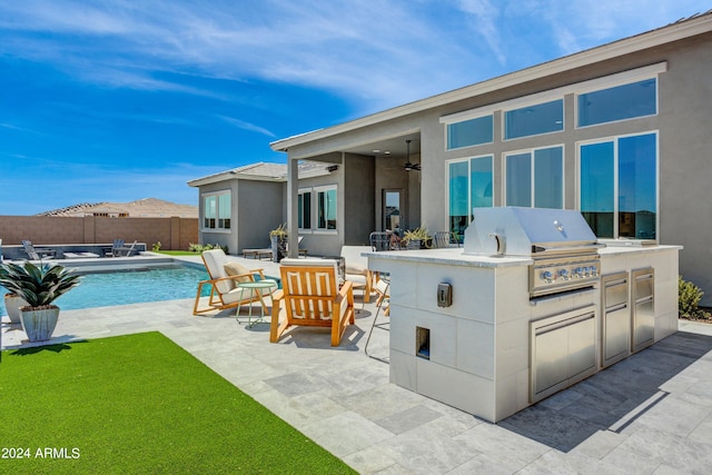 view of patio with a fenced in pool, grilling area, area for grilling, and ceiling fan