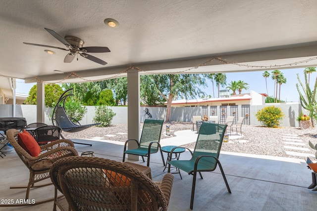 7736 E Rancho Vista Dr, Scottsdale, AZ 85251 - view of patio featuring a fenced backyard and a ceiling fan