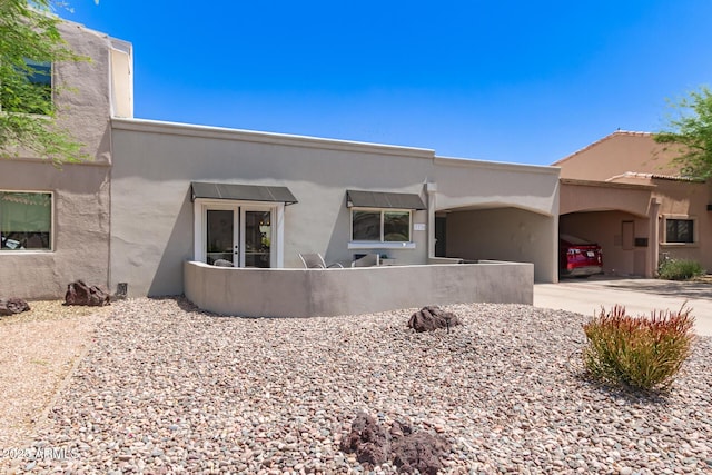7736 E Rancho Vista Dr, Scottsdale, AZ 85251 - adobe home featuring stucco siding