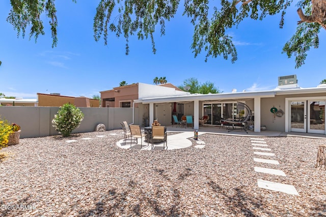 7736 E Rancho Vista Dr, Scottsdale, AZ 85251 - rear view of house with fence, stucco siding, and a patio area