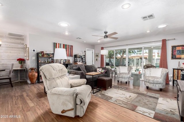 7736 E Rancho Vista Dr, Scottsdale, AZ 85251 - living area with a ceiling fan, wood finished floors, and recessed lighting