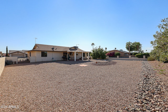 rear view of house with a patio area