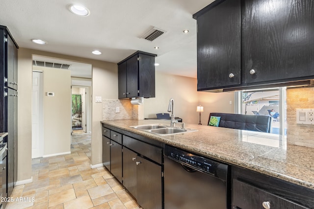 kitchen with a sink, visible vents, light countertops, decorative backsplash, and dishwasher