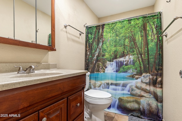 full bathroom with vanity and toilet