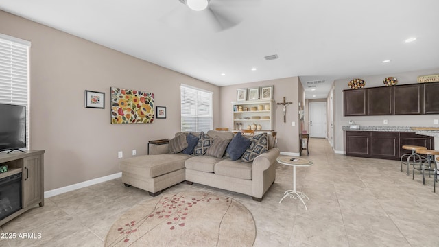 37820 W San Sisto Ave, Maricopa, AZ 85138 - living room featuring a ceiling fan, light tile patterned flooring, visible vents, and recessed lighting