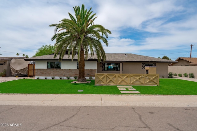 8214 E Northland Dr, Scottsdale, AZ 85251 - view of front of property featuring a front yard and brick siding