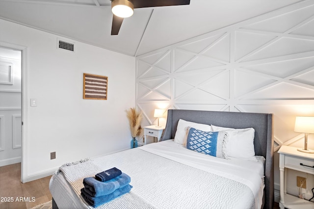 8214 E Northland Dr, Scottsdale, AZ 85251 - bedroom featuring wood finished floors, ceiling fan, and baseboards