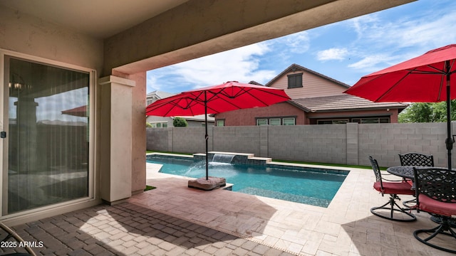 view of pool featuring a fenced in pool, a patio area, and a fenced backyard