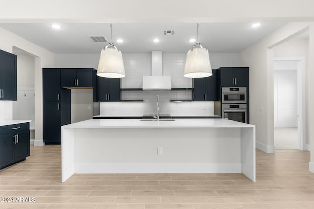 kitchen featuring visible vents, decorative backsplash, light countertops, and stainless steel double oven