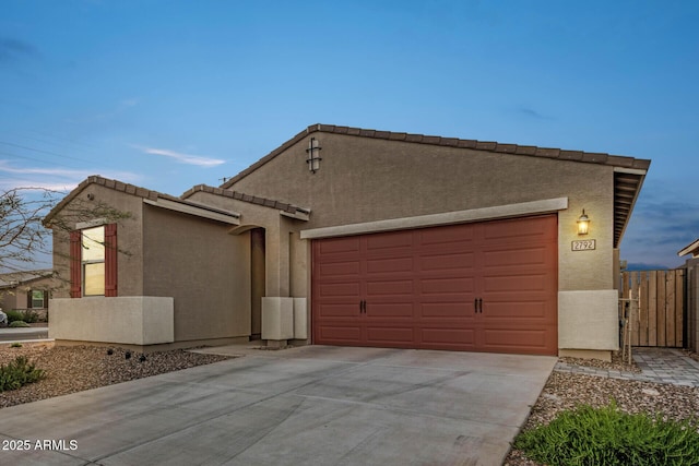 2792 E James Ave, San Tan Valley, AZ 85143 - exterior space with stucco siding, concrete driveway, and a garage