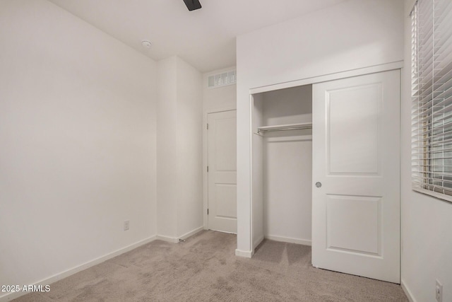 2792 E James Ave, San Tan Valley, AZ 85143 - unfurnished bedroom with baseboards, visible vents, a closet, and carpet floors