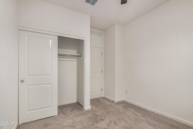 2792 E James Ave, San Tan Valley, AZ 85143 - unfurnished bedroom with a closet, visible vents, baseboards, a ceiling fan, and carpet floors
