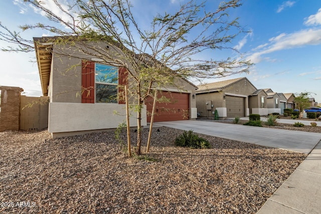2792 E James Ave, San Tan Valley, AZ 85143 - view of side of property featuring fence, driveway, and a garage