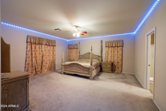 carpeted bedroom featuring ceiling fan