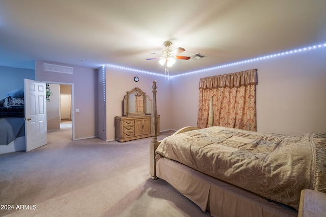 bedroom featuring ceiling fan and carpet flooring