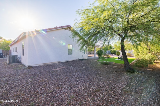 view of home's exterior featuring central AC unit