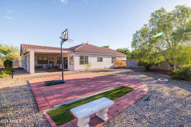 back of property featuring a patio